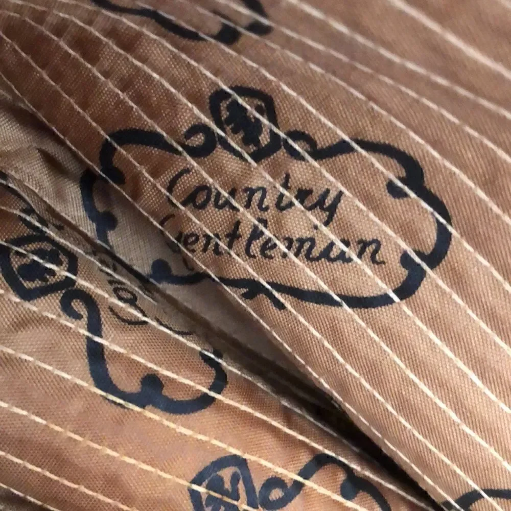 Country Gentleman’s Corduroy Wide Brim Ranch Hat in Tan Feather and braid accent